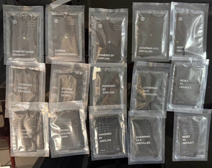 Fifteen sealed AirSpace cards laid out in three rows on a table